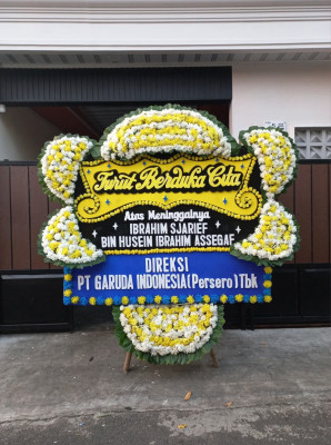 Papan Bunga Duka di Gonda Baru